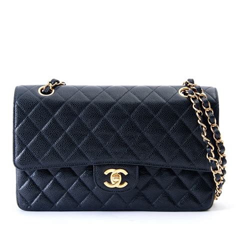 chanel classic timeless clutch black caviar|Bags .